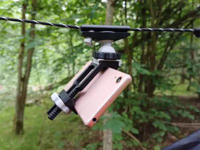 Phone holder for hammocks, tents, rope lines