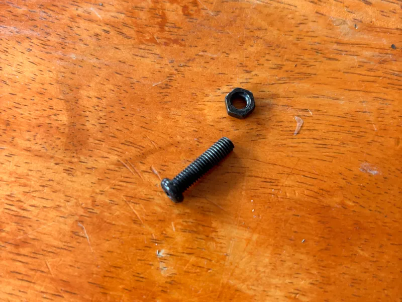 SCREWS and Nuts. 2.5cm by 0.3 cm