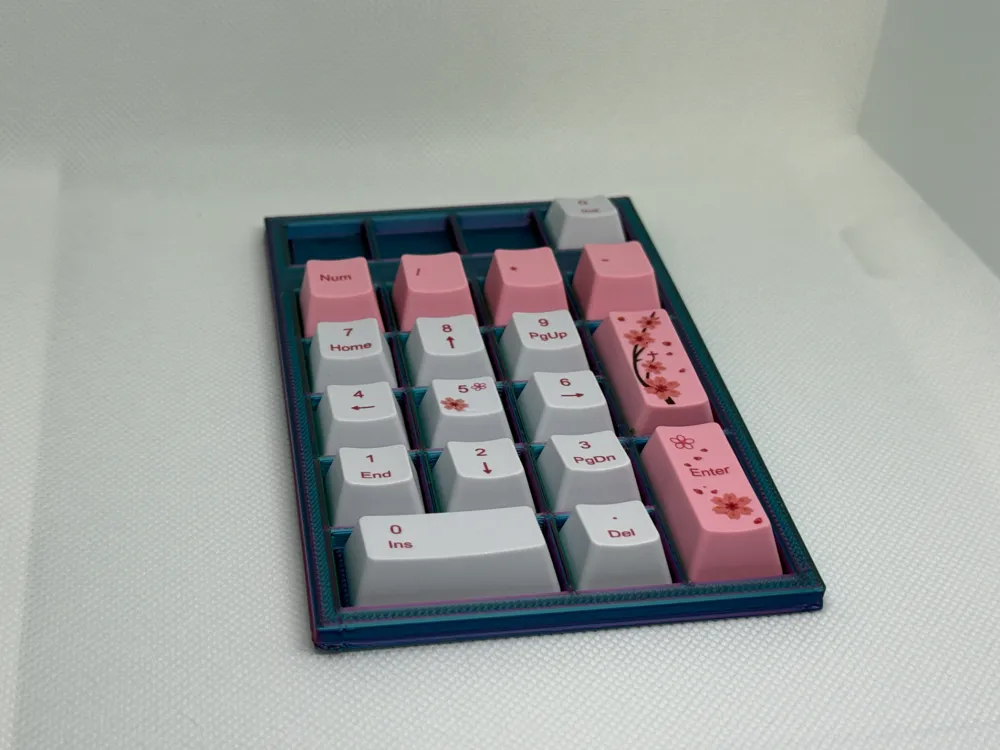 Stackable Numpad Keycap Storage Remixed by Humnarr - MakerWorld