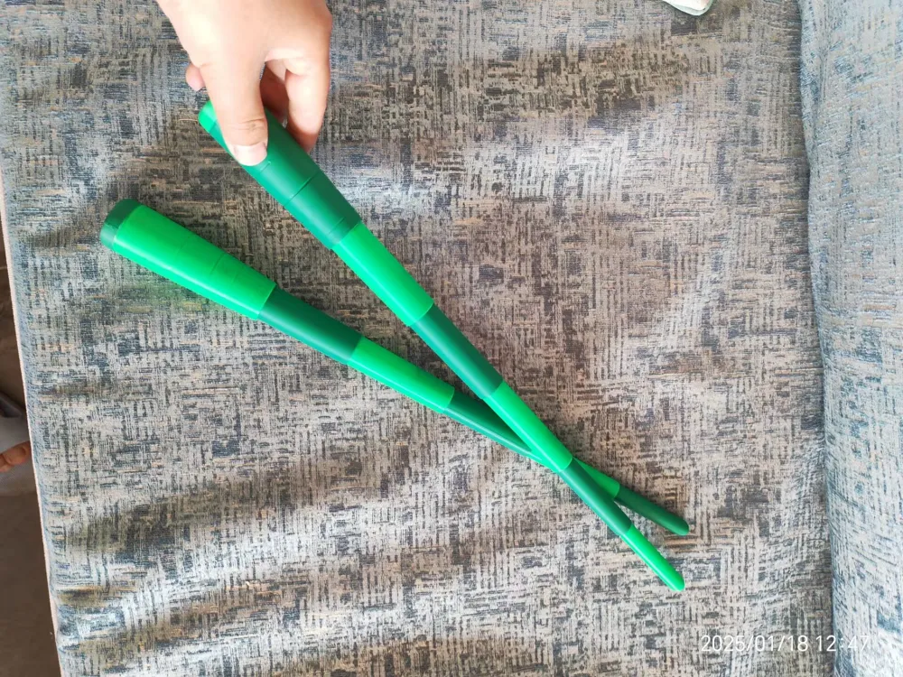 Safe and durable retractable sword—articulated bamboo spiral ...
