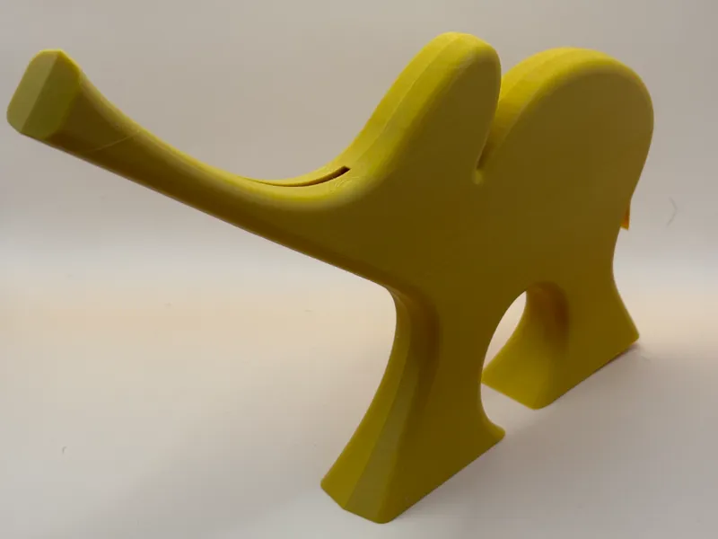 Elephant piggy bank with moving tail