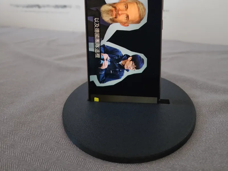 Bed cell phone holder