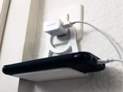 Phone charger hanger