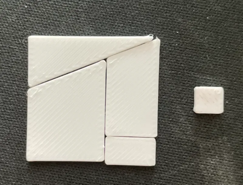 Rearranging tile optical puzzle