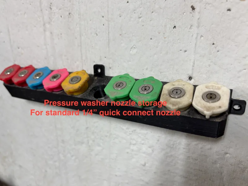 Pressure washer nozzle storage