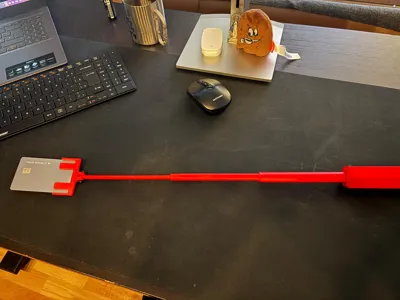 ReachMate: Telescopic Parking Card Extender