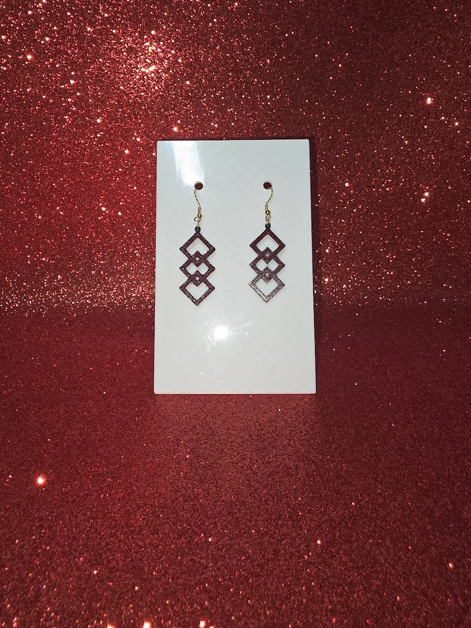 Intertwined diamonds earrings view 2