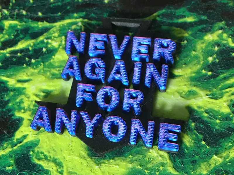NEVER AGAIN FOR ANYONE