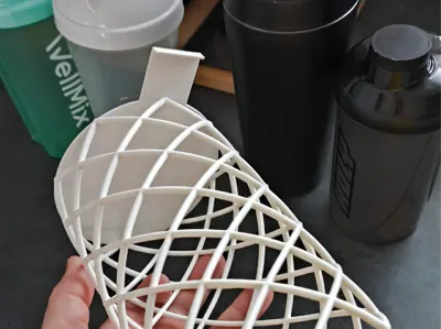 Under-shelf bottle holder