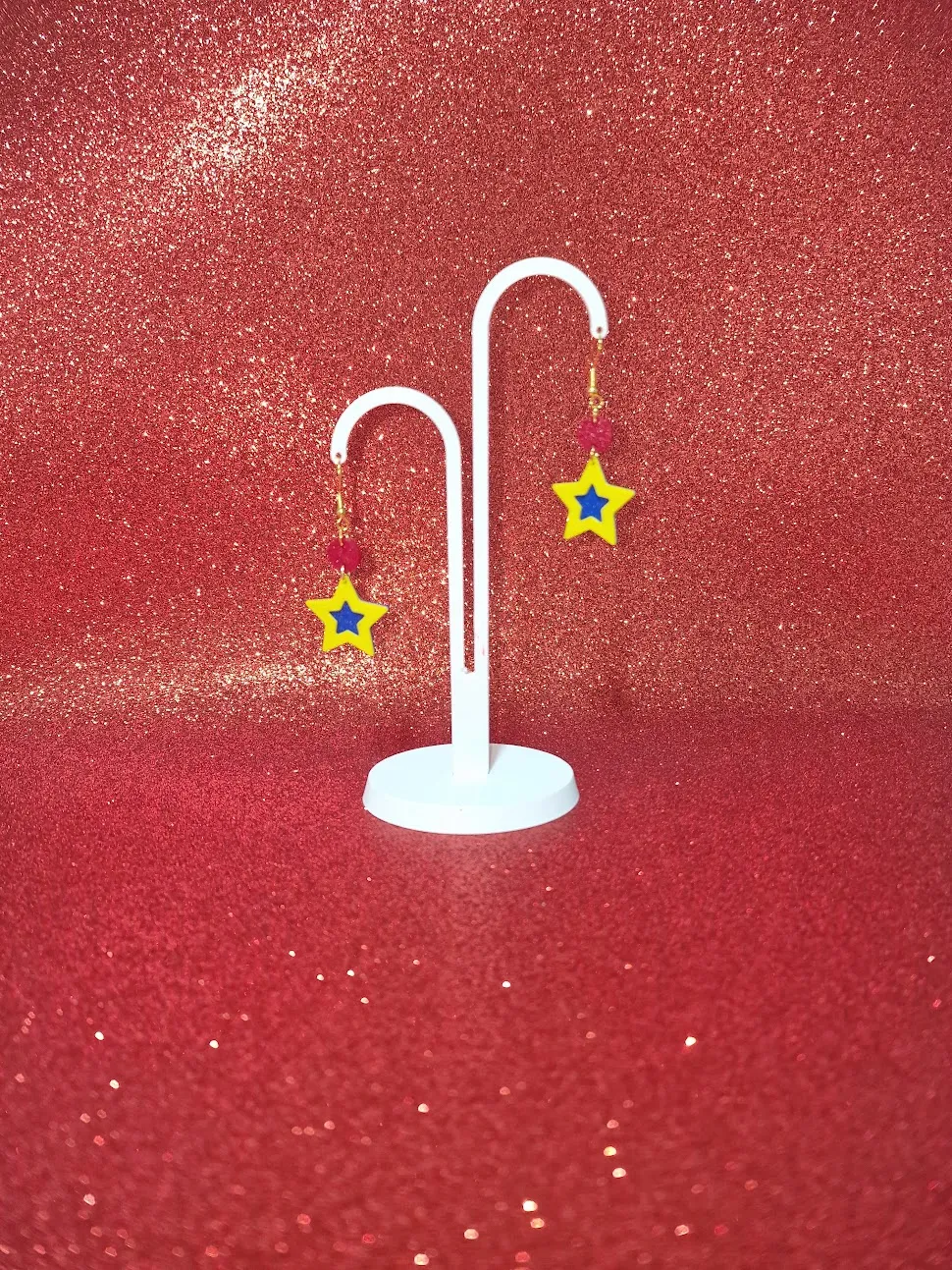 Blue and yellow star earrings view 3