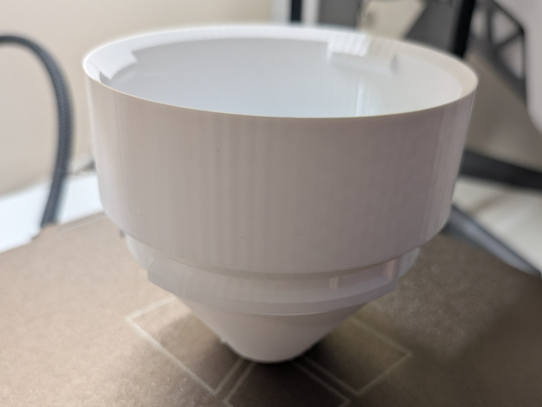 Hydroponic tower anti-splash spacer
