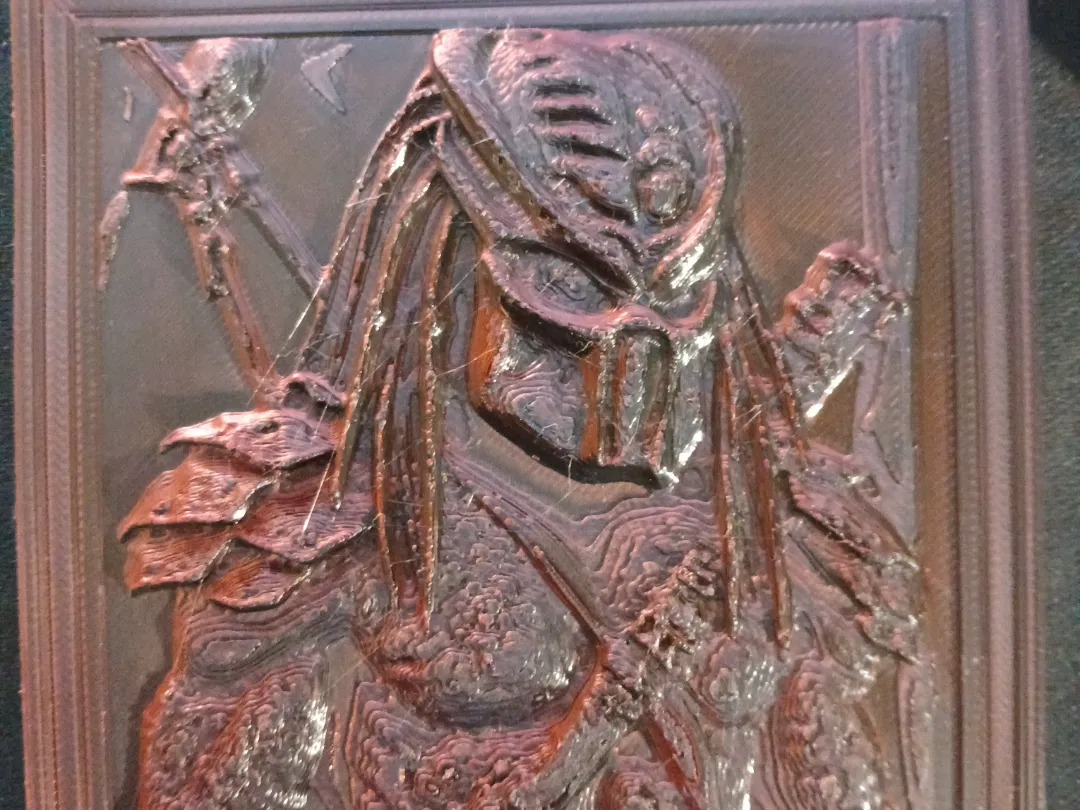 Relief tête de Predator
