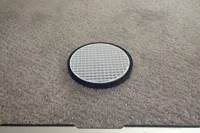 Grid spill proof coaster AMS