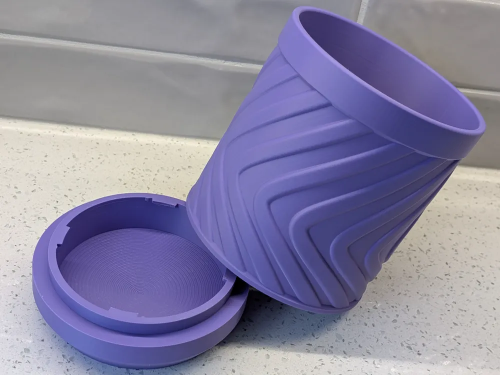 Swirl planter pot with drip tray - Free 3D Print Model - MakerWorld