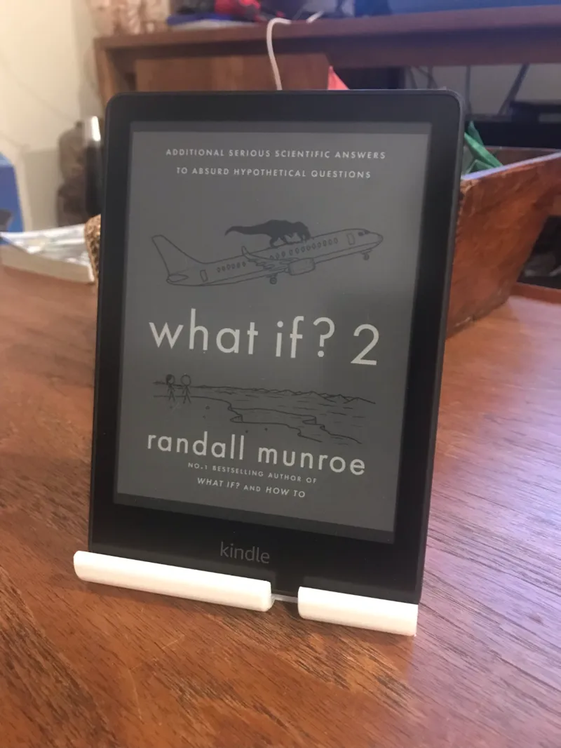 Kindle holder with button space