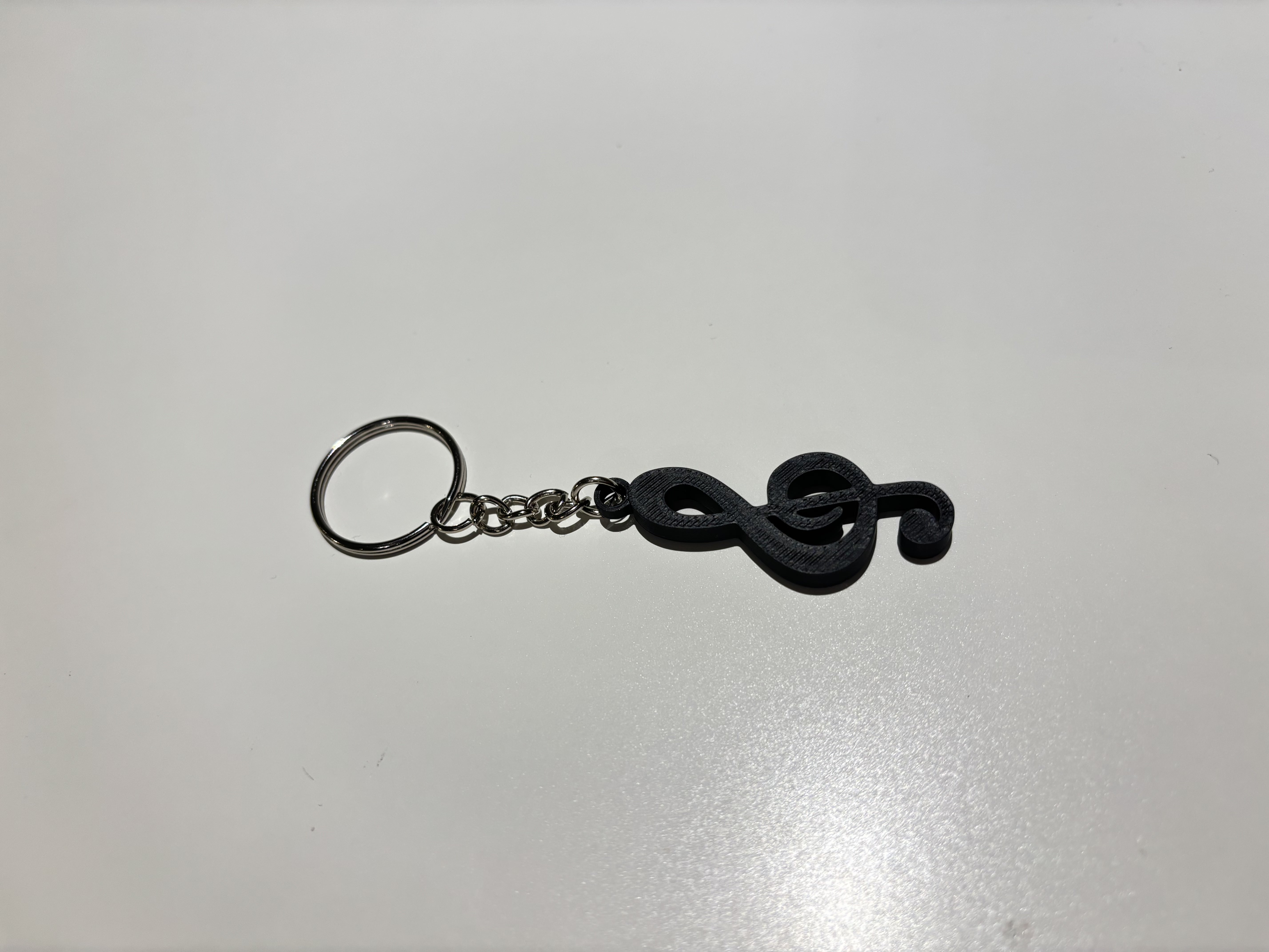 Miniatura 1 do modelo 3D Small Music Note Keychains