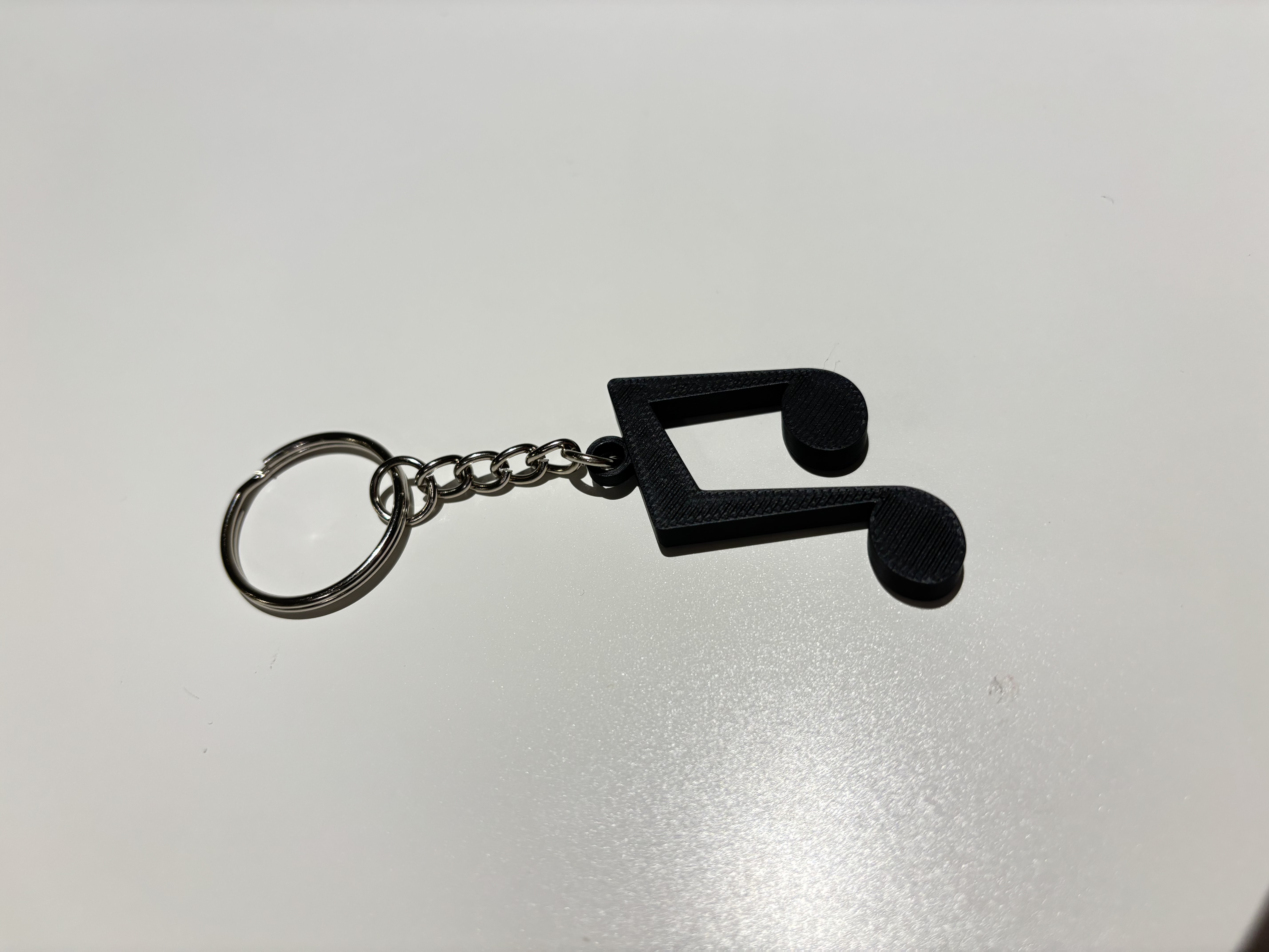 Miniatura 2 do modelo 3D Small Music Note Keychains