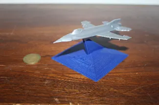 F-16 displayed on stand