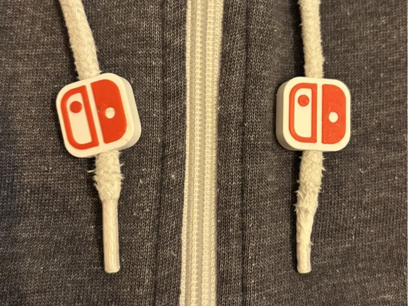 Kapuzenpulli-Kordelstopper Nintendo Switch logo