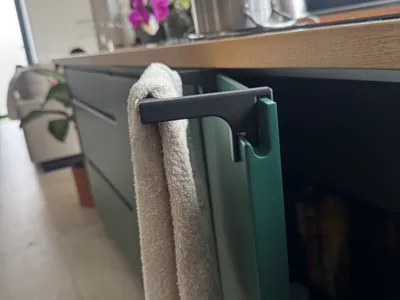 hand towel hanger with finger pull
