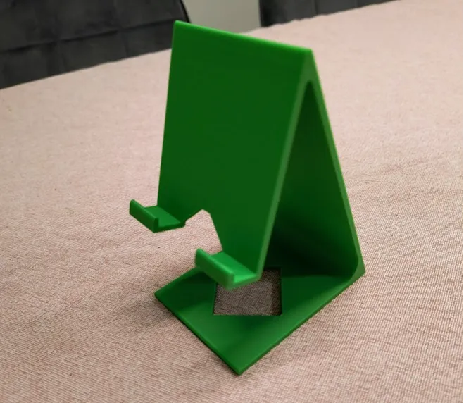 Yet another phone holder (allows a charging cable)