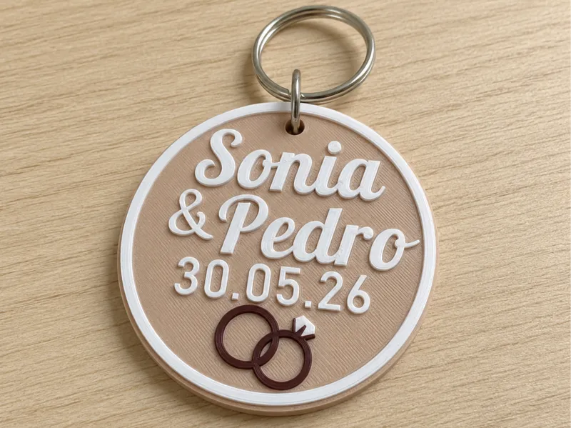 Llavero detalle boda personalizado con anillos