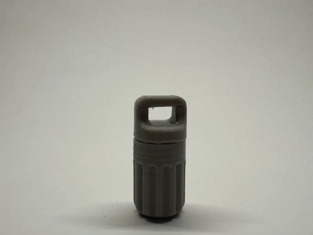Capsule porte-clés