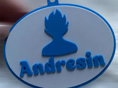 Goku keychain with the name Andresin
