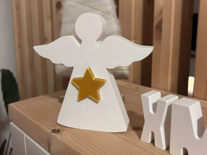Weihnachtsengel mit Stern 