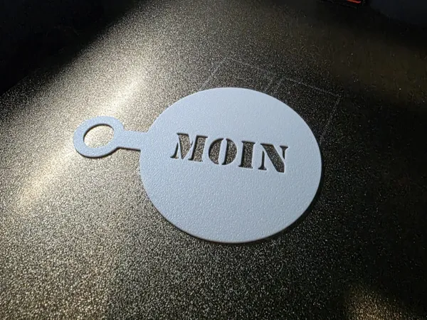 Pochoir à café — inscription Moin