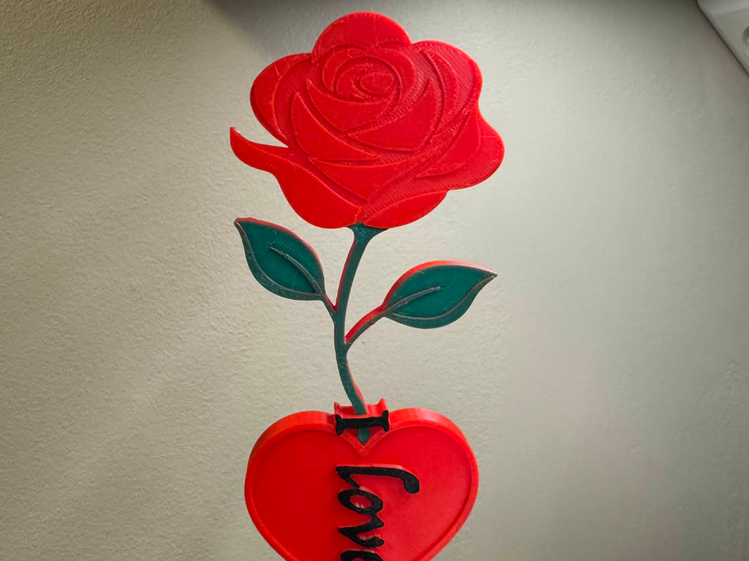 Rose with I LOVE YOU text