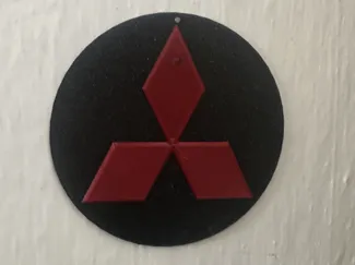 Mitsbishi logo on the wall