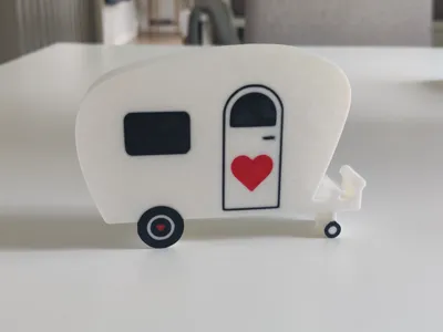 Bottle opener with caravan motif