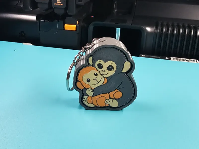Punch the macaque monkey and orangutan clicker