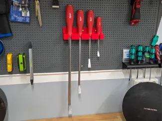 Wall or pegboard hanger for Milwuakee Pry Bar Set