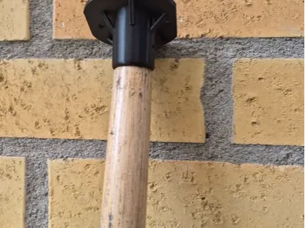 Broom handle bracket