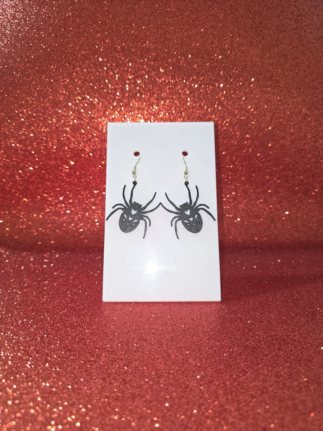 Spider heart earrings view 2