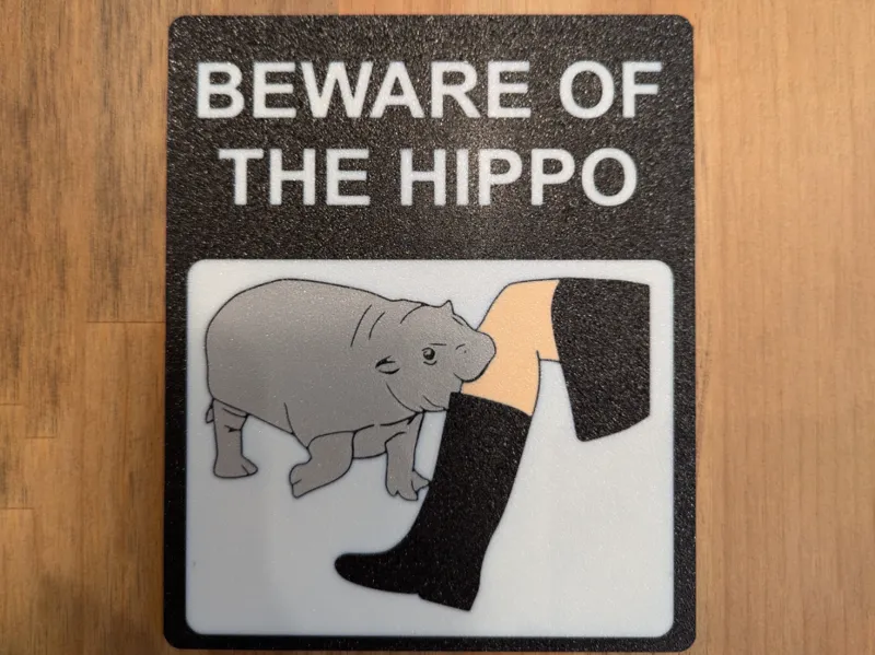 Baby hippo beware sign