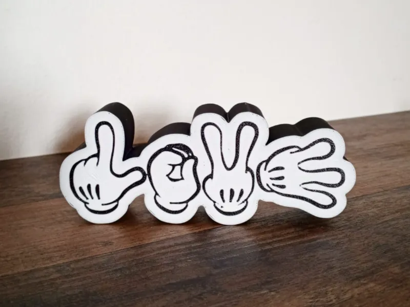 Mickey mouse hands showing LOVE