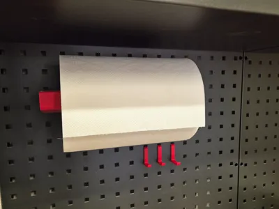 Paper towel holder for square pegboard