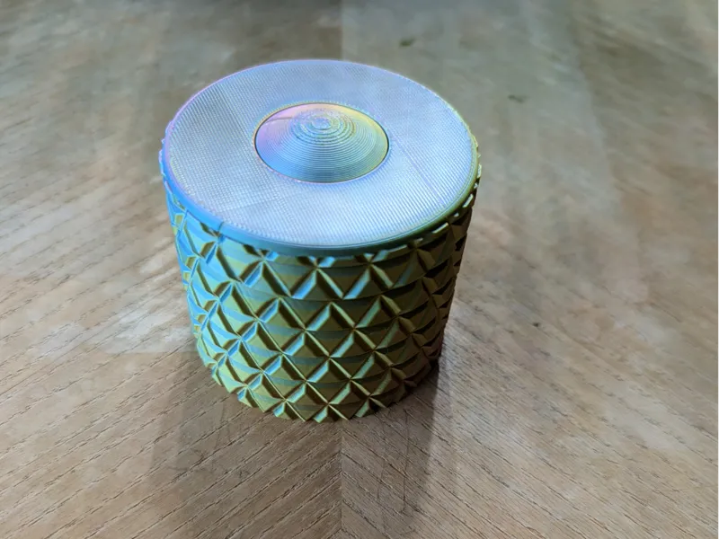 Box with push button to open