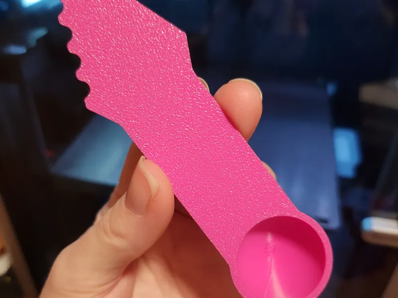Tool with knife and spoon for kinetic sand play