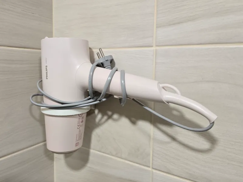 Minimalistic hair dryer holder. No screws!
