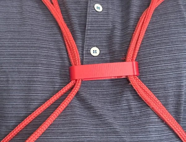 Clip de serrage pour cordons de sac à dos