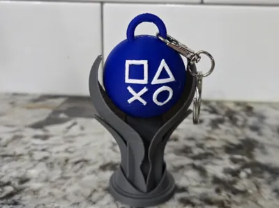 PlayStation platinum keychain