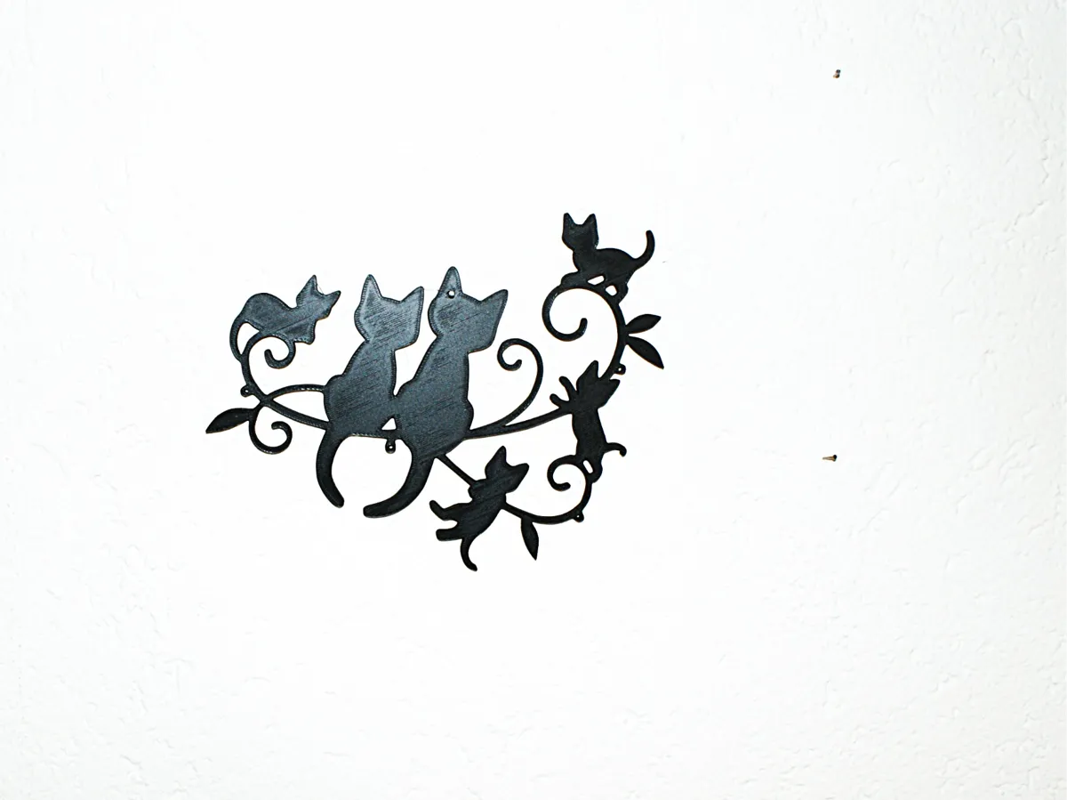 Famille de chats en décoration murale