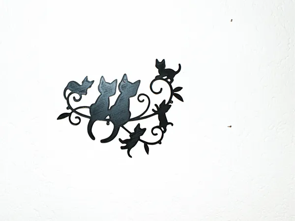 Famille de chats en décoration murale