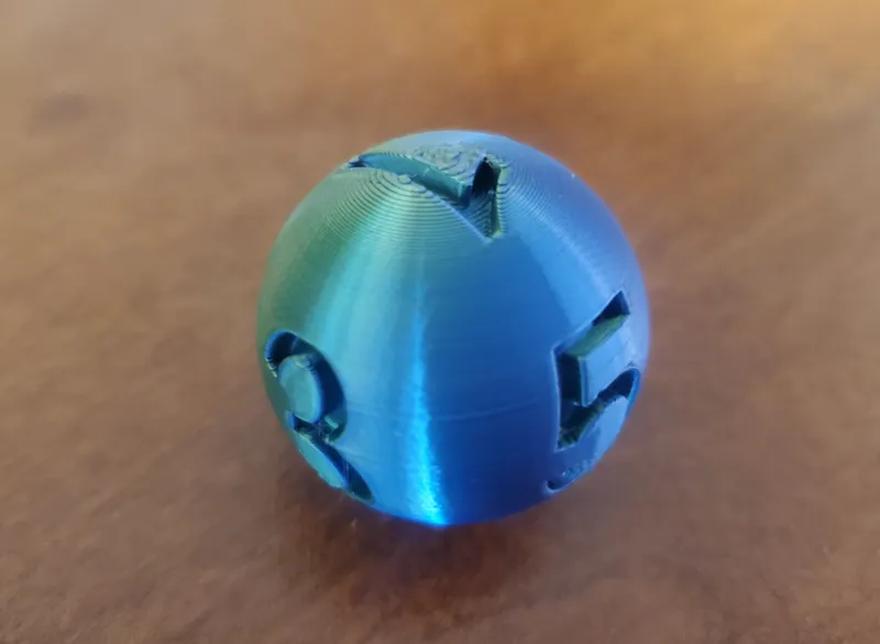 Small Spherical Six-Sided Dice