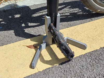 Folding crank kickstand
