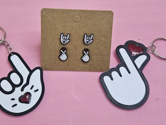 Pendientes manos con corazon